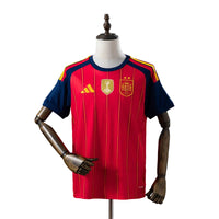 Maillot Espagne Home 26/27 avec deux étoiles et l'écusson de champion du monde